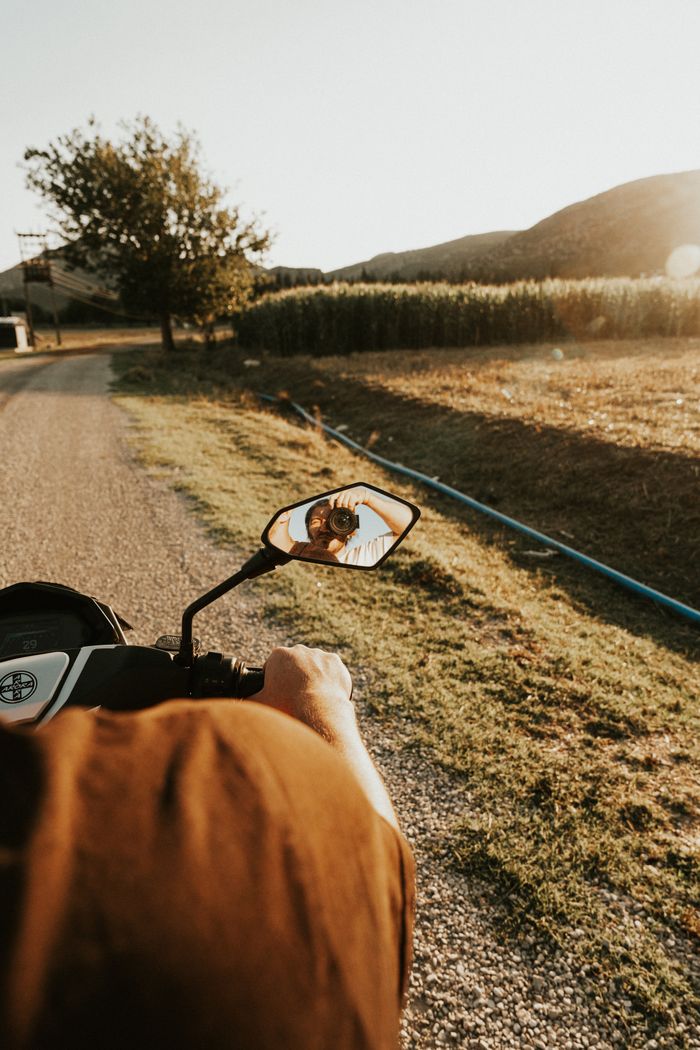 Enjoy a peaceful ride through rural landscapes during sunset, perfect for travel and adventure seekers.